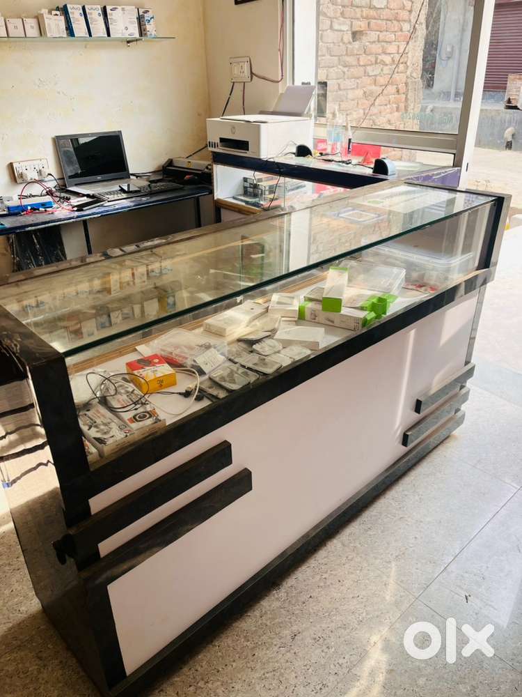 2 counter 5 foot and 4 foot new condition with 20 wall glass rack ...