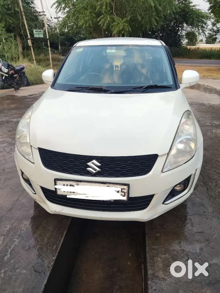 Maruti Suzuki Swift Lxi 2016