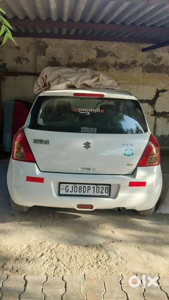 Maruti Suzuki Swift Lxi 2011