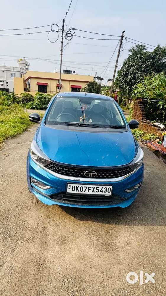 This Is The Top Model Tata Tiago  It's A New Car Driveen Only 9000 Km