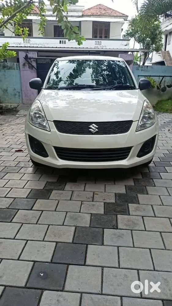 Maruti Suzuki Swift Lxi Optional 2015 Petrol 49700 Km Driven
