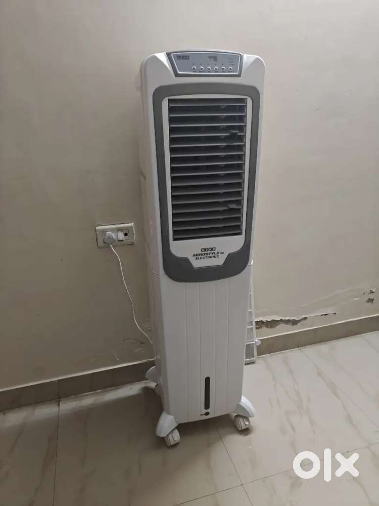 Selling Usha tower cooler medium size with remote. Price negotiable