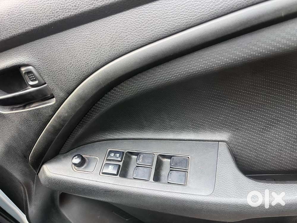 Maruti Suzuki Brezza 1.5 Lxi Smart Hybrid, 2024, Petrol