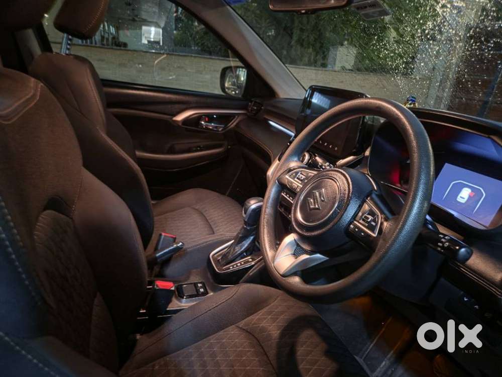 Maruti Suzuki Grand Vitara 1.5 Zeta Plus Dual Tone Intelligent Hybri..