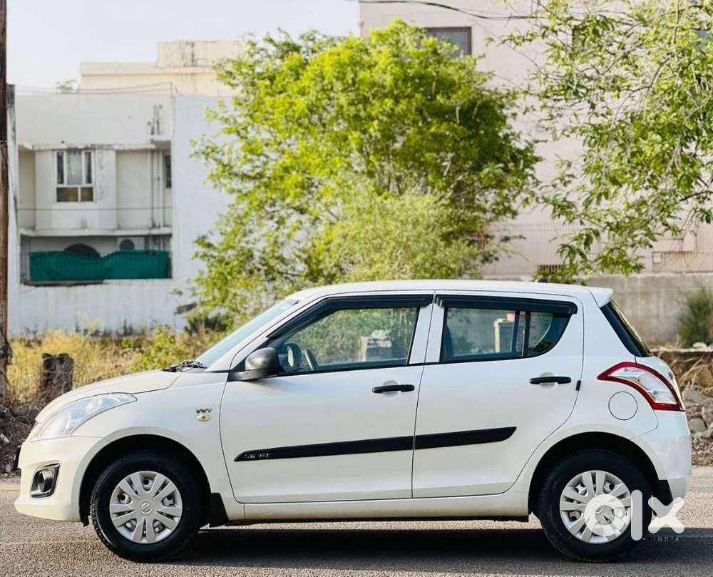 Maruti Suzuki Swift Lxi Optional-o, 2017, Petrol