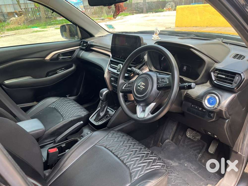 Maruti Suzuki Grand Vitara 1.5 Zeta Plus Dual Tone Intelligent Hybri..
