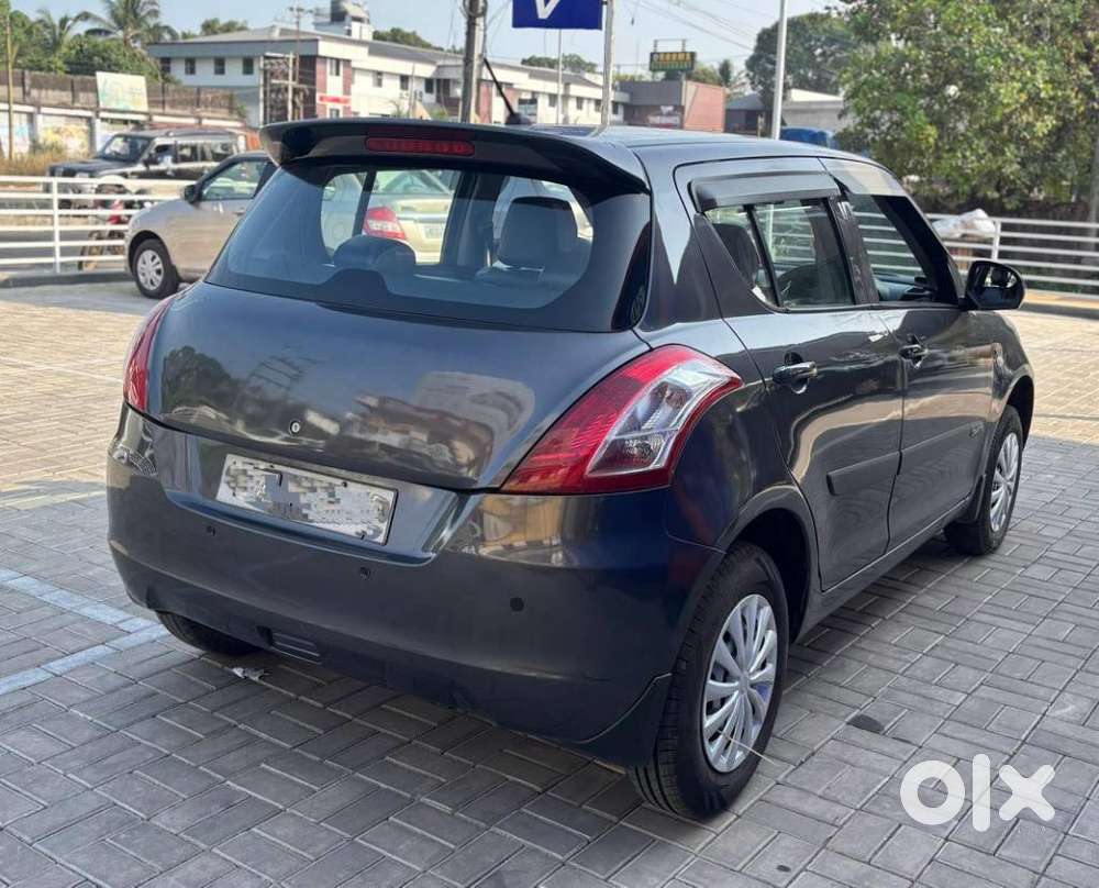 Maruti Suzuki Swift Lxi Optional-o, 2015, Petrol