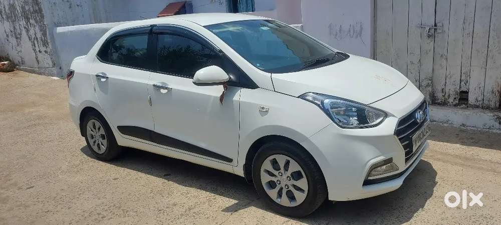 Hyundai Xcent Cng + Petrol  40,000 Km  32 Km/kg Mileage  Excellent