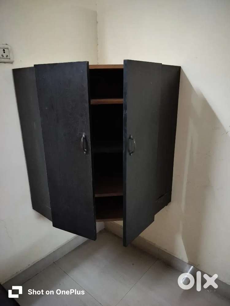 Corner Cupboard wall mounting with four shelves and two doors