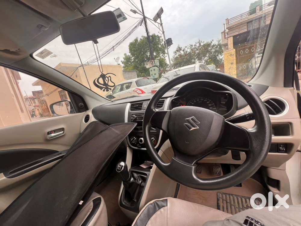 Celeio White Colour Non Accident Car Company Record