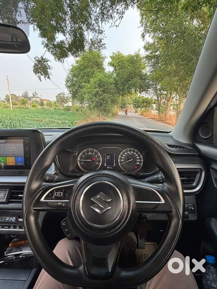 Maruti Suzuki Brezza Vxi December 2025