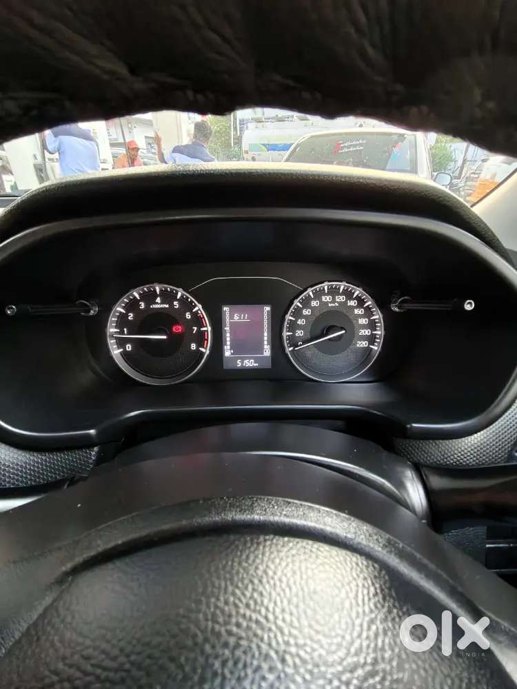 2025 Maruti Suzuki Brezza Lxi Petrol  5,000 Km  1st Owner