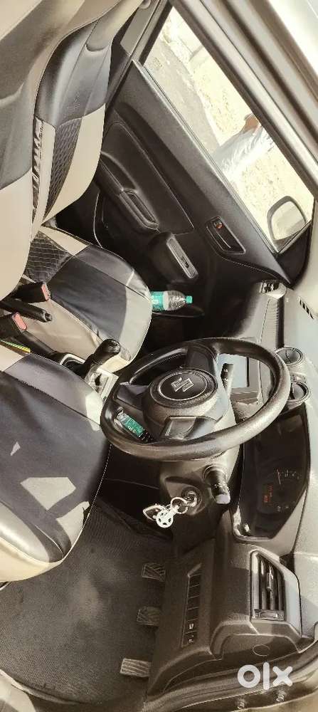 Swift Maruti Lxi 2020 Kms Driven