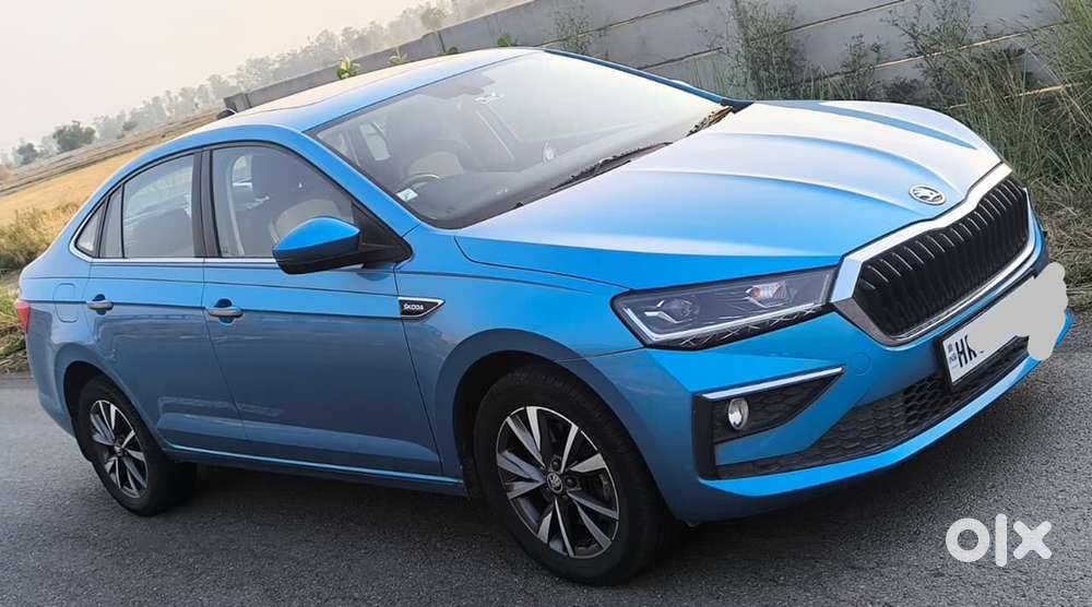 Crystal Blue Skoda Slavia Petrol 2024