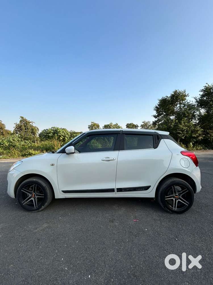 Maruti Suzuki Swift 1.2 Lxi (o), 2022, Petrol
