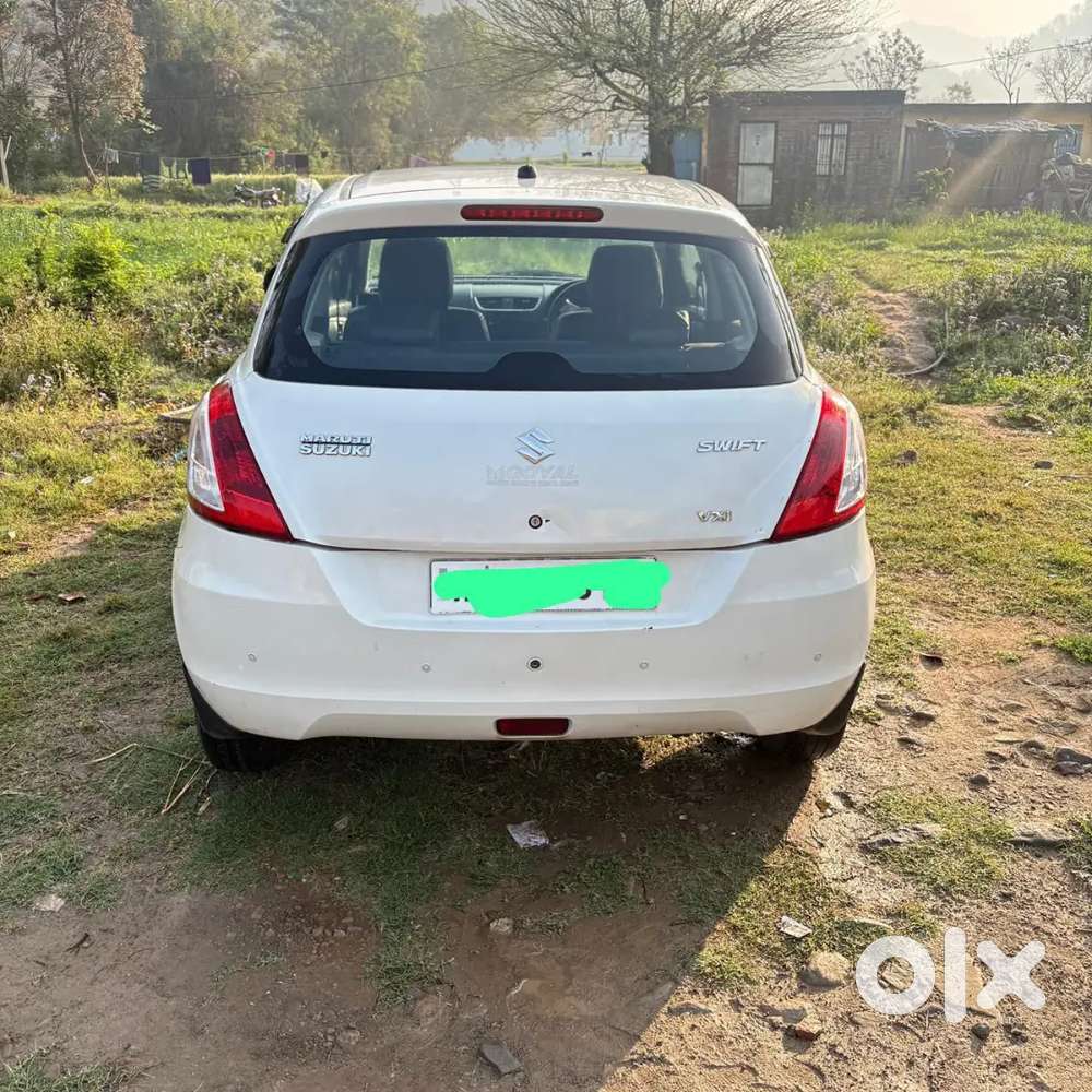 Swift 1.2 Star Vxi 2014 Km Driven