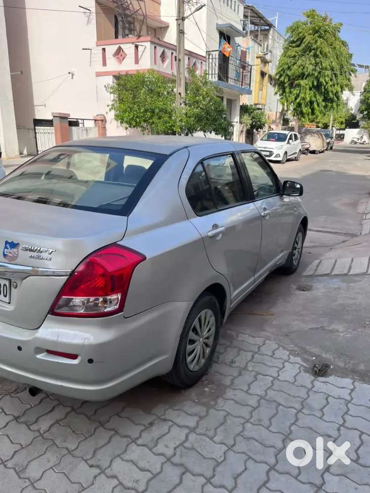 સિલ્વર કલર Swift Dzire મોટી દેકી વાડી