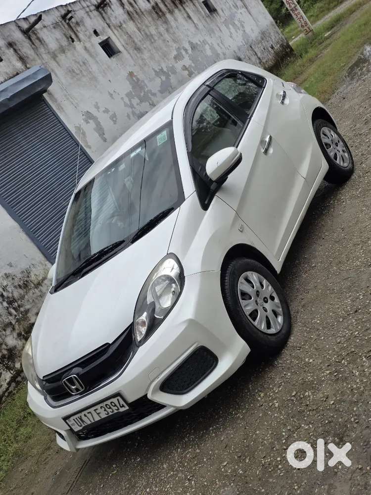 Honda Brio Smt
1st Owner 
Central Locking