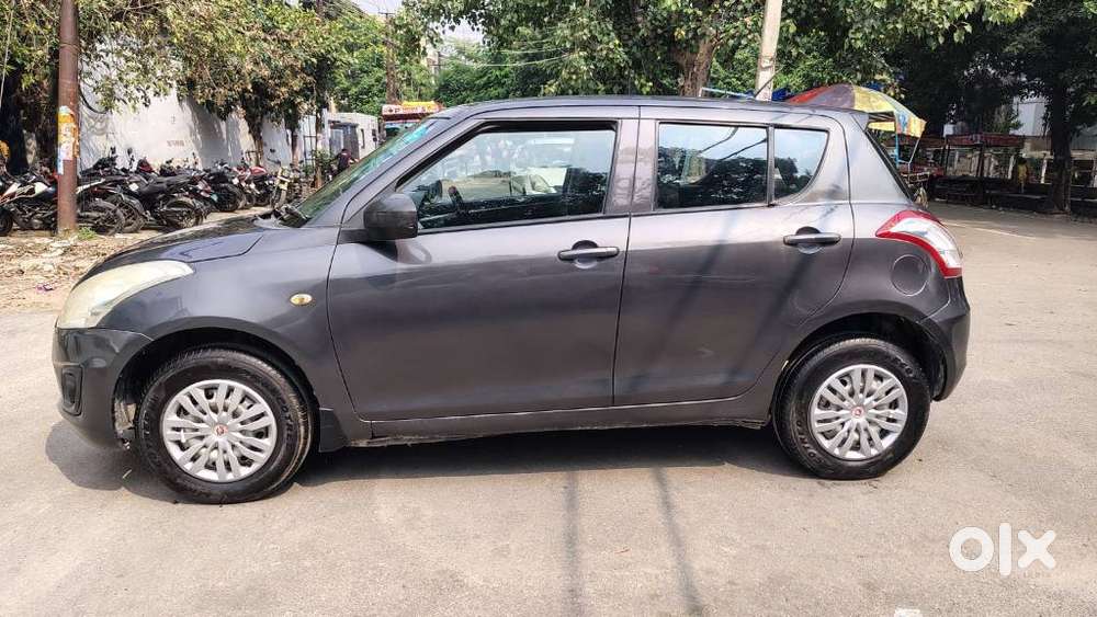 Maruti Suzuki Swift Lxi Optional-o, 2015, Petrol