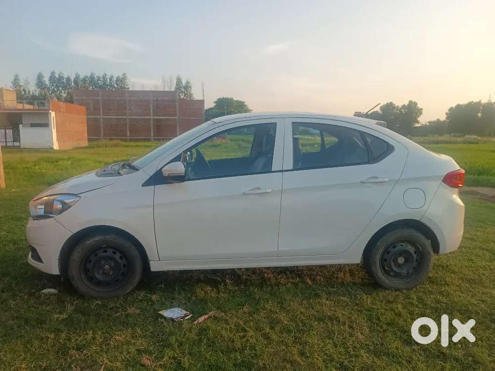 Tata Tigor Petrol 2017  .  7 Seater Car Lena H