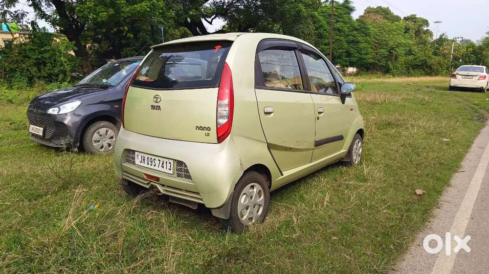 Tata Nano Lx 2012 Magenta Green Colour