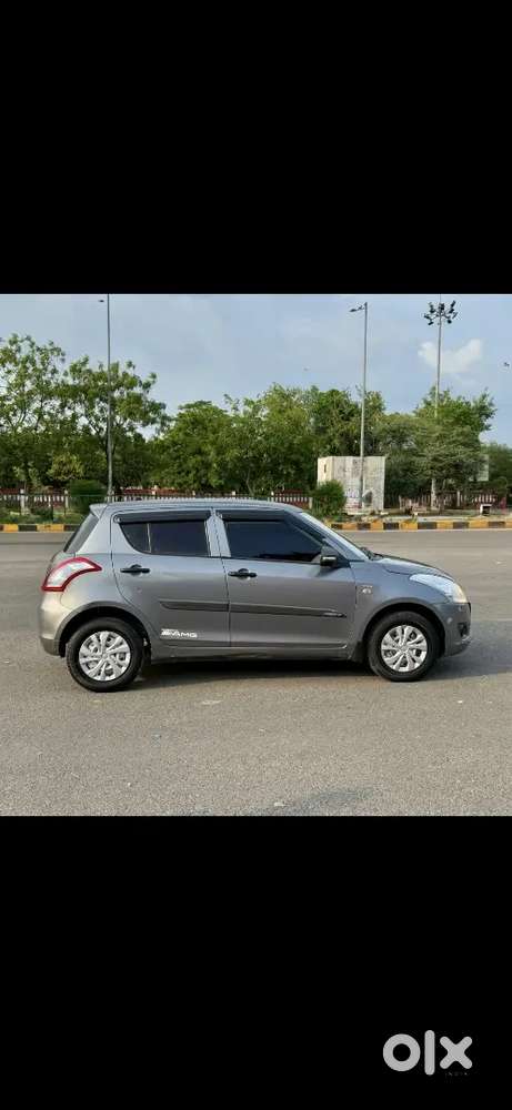 Maruti Suzuki Swift Lxi 2014