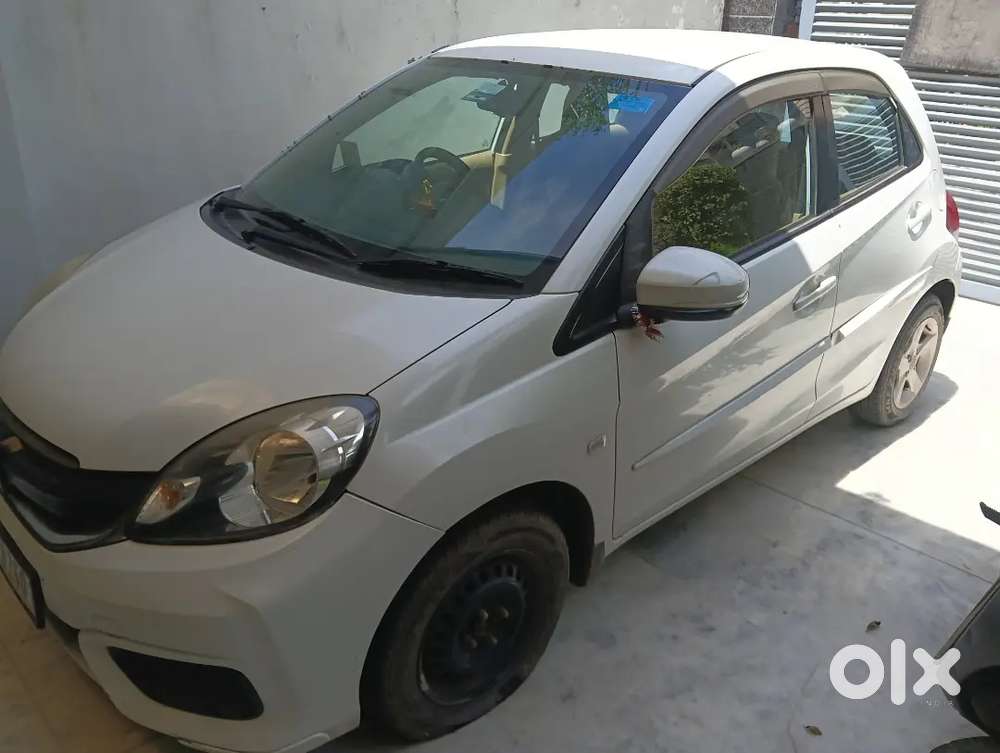 White Petrol Car For Sale – Low Running, Excellent Condition