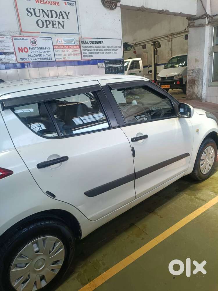 Swift Petrol 2015 Pearl White