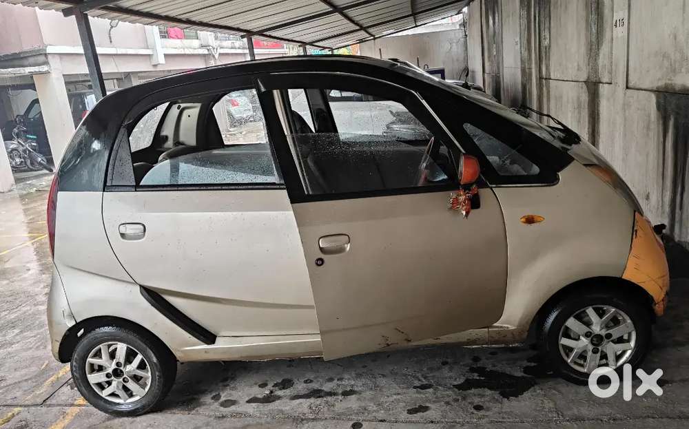 Tata Nano Xt In Full Running Condition With Alloy Wheels And Dual Tone