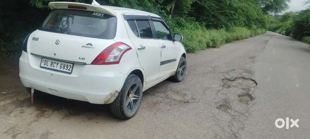 Maruti Suzuki Swift Lxi 2016