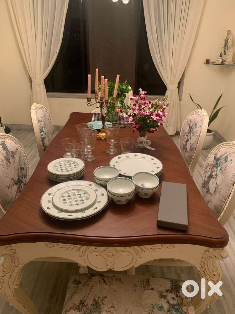 Teakwood dining table and six chairs