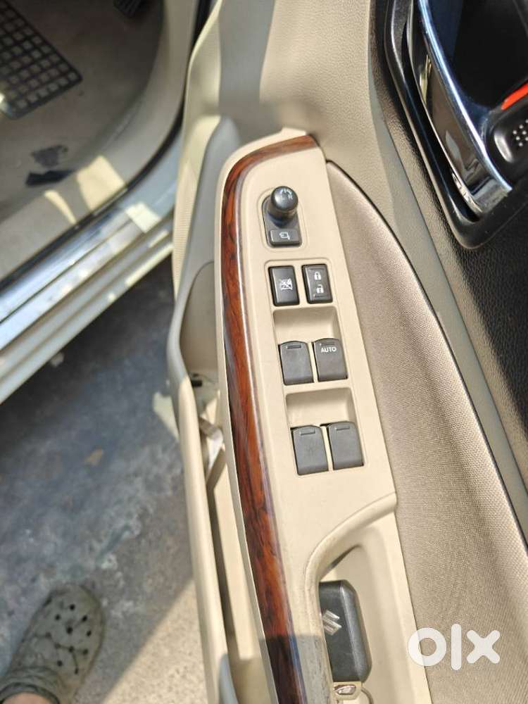 Maruti Suzuki Swift Dzire 1.3 Zxi, 2019, Petrol