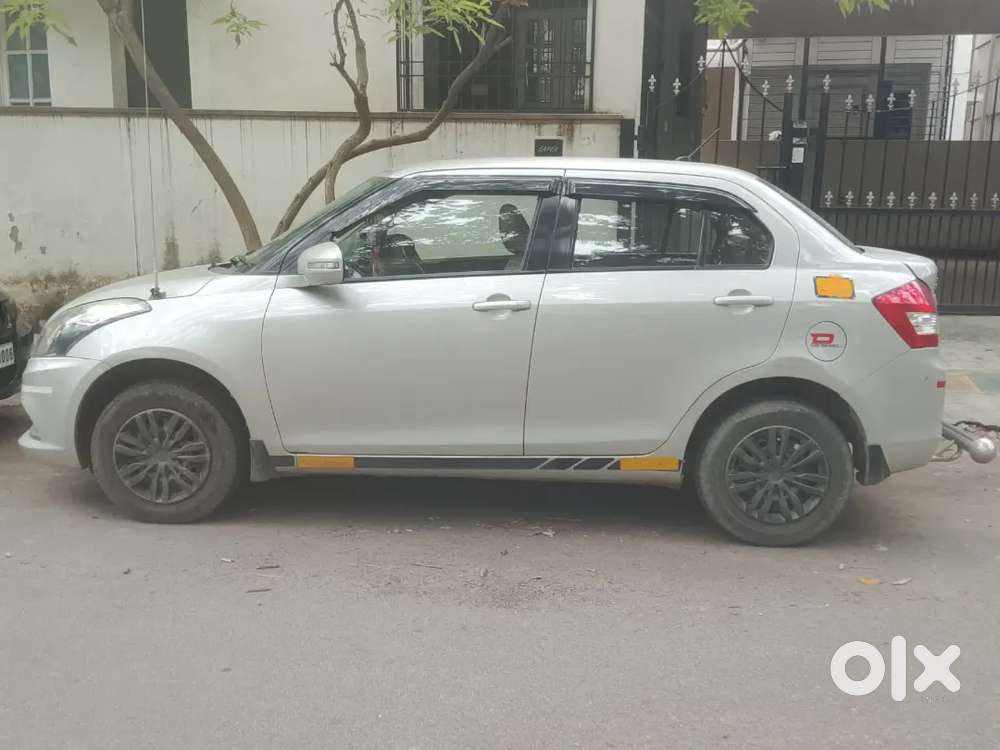 Maruti Suzuki Swift Dzire 2015 Yellow Board