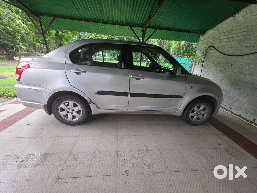 Maruti Suzuki Dzire-2010-first Owner-silky Silver