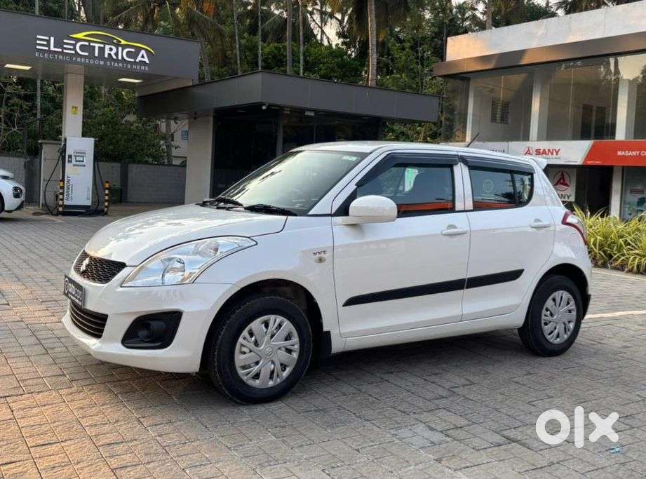 Maruti Suzuki Swift Lxi Optional-o, 2015, Petrol