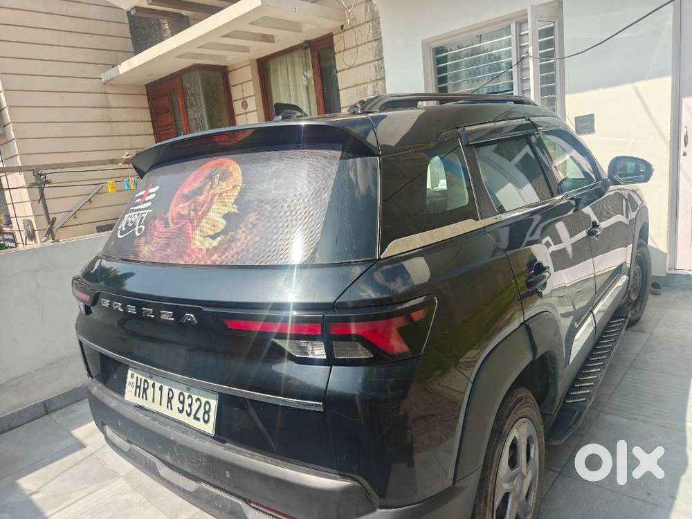 Maruti Suzuki Brezza Vxi 2025