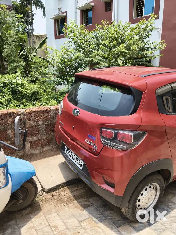 Well-maintained 2018 Mahindra Kuv100 K2 (red)