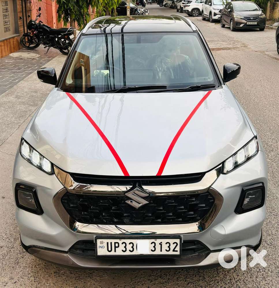 Maruti Suzuki Grand Vitara 1.5 Zeta Plus Dual Tone Intelligent Hybri..