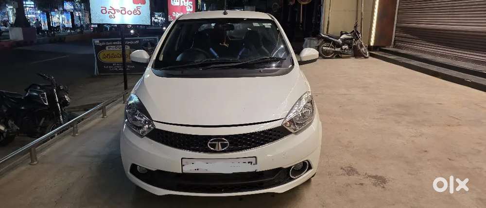 It's Tata Tiago Diesel Excellent Condition With Ceramic Cote