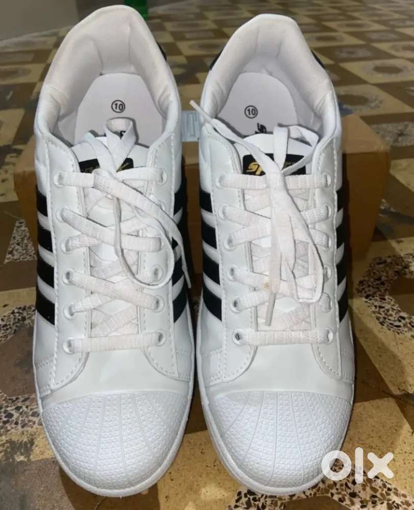 Sparx white shoes on sale with black stripes