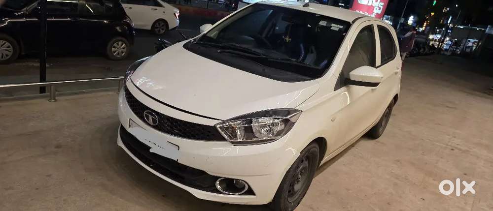 It's Tata Tiago Diesel Excellent Condition With Ceramic Cote