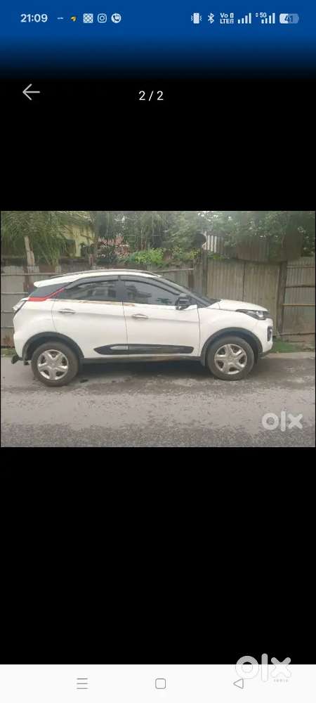Tata Nexon White Colour With Base Tube Harmon Sound System