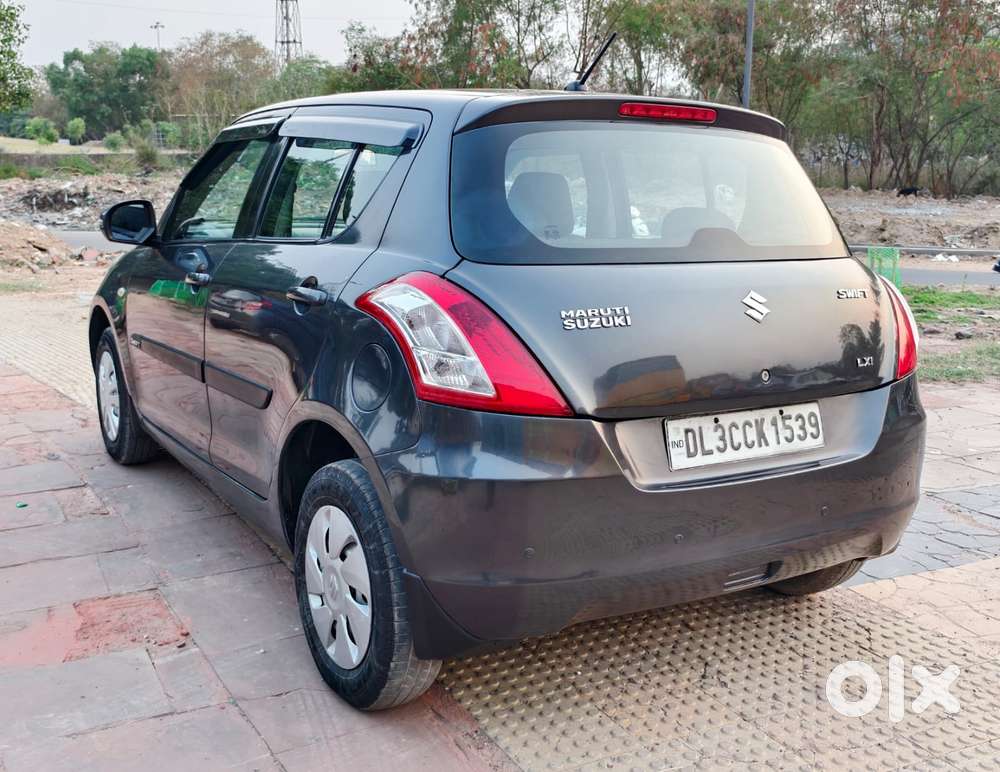 Maruti Suzuki Swift Lxi Optional-o, 2015, Petrol