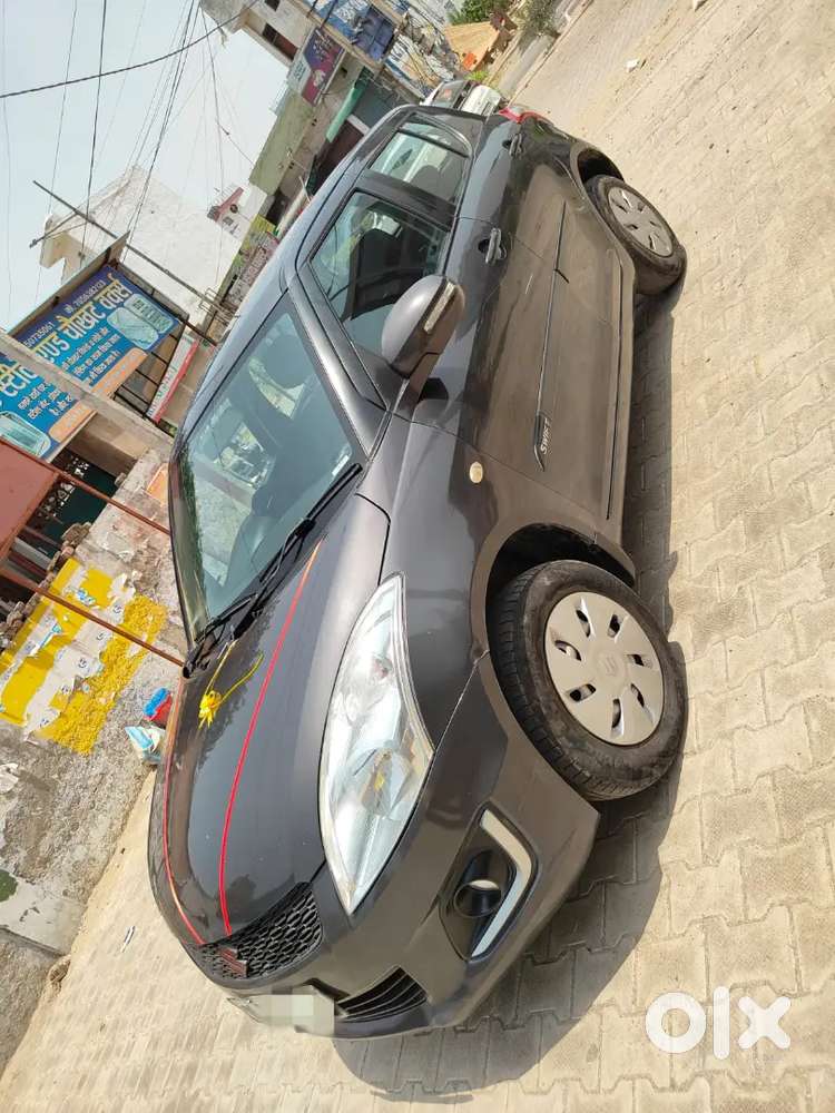 Maruti Suzuki Swift Lxi 2016