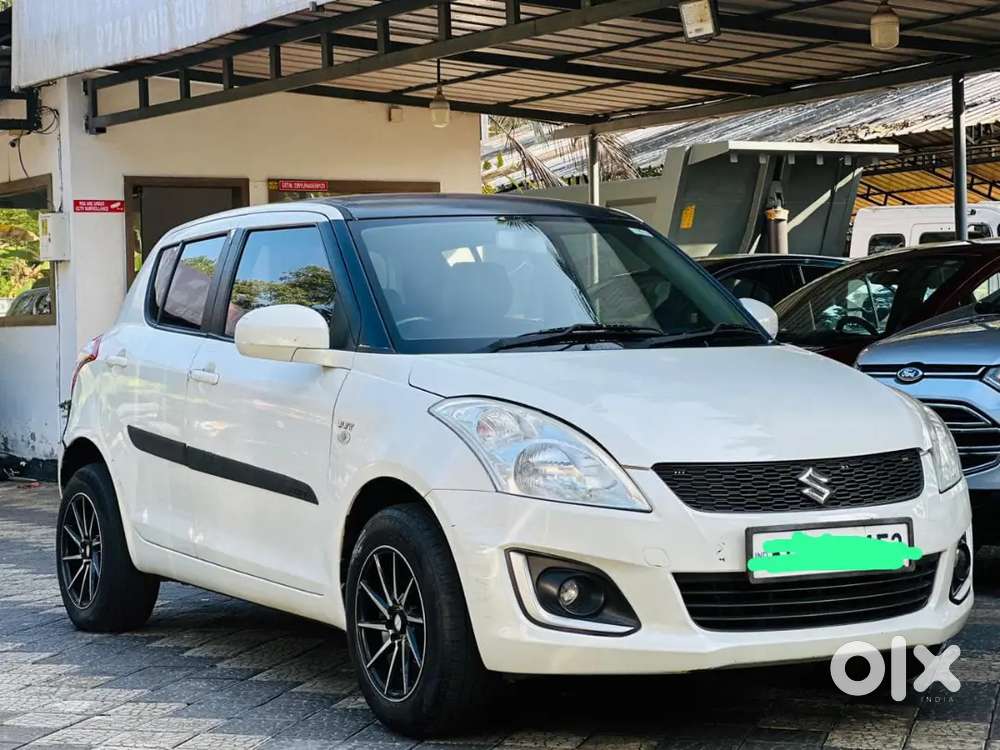 Maruti Suzuki Swift Lxi 2015
