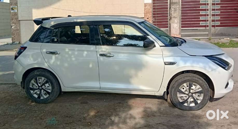 Maruti Suzuki Swift 1.2 Lxi (o), 2024, Petrol