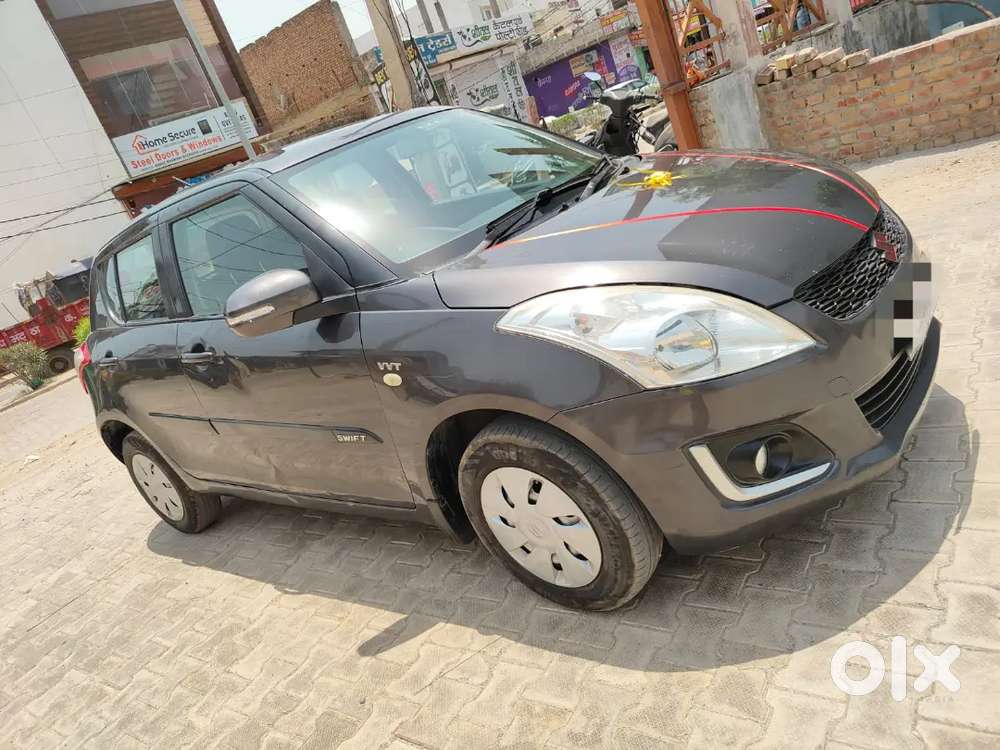Maruti Suzuki Swift Lxi 2016