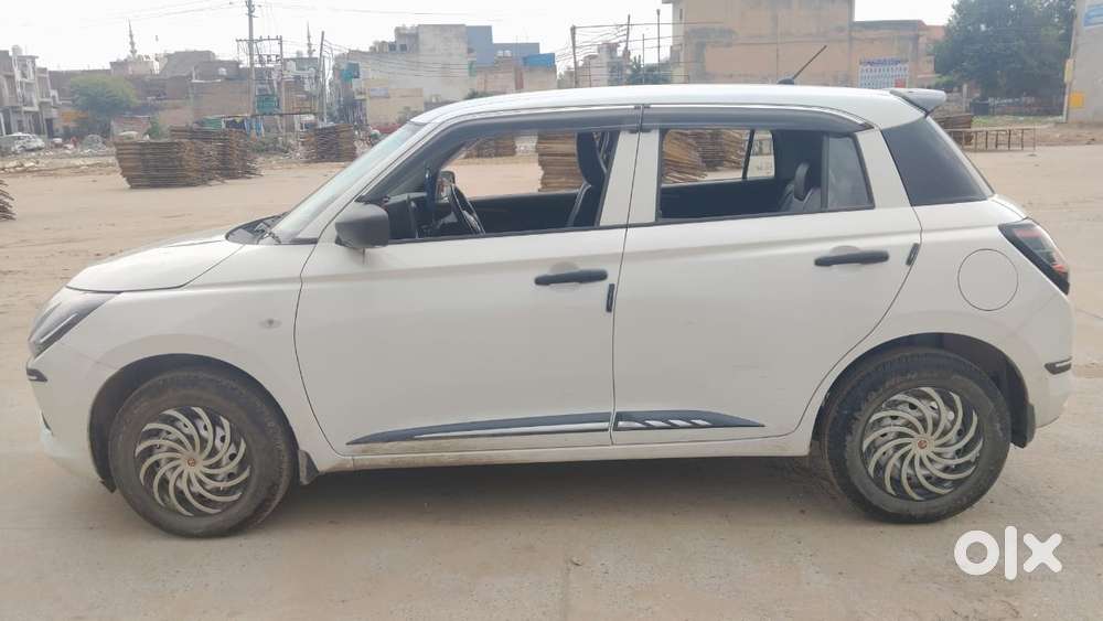Maruti Suzuki Swift 1.2 Lxi (o), 2024, Petrol