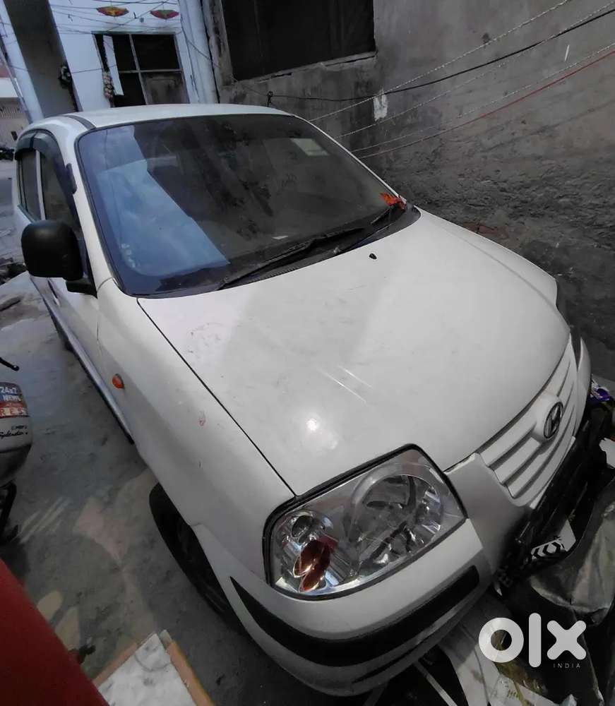 Car With Cng In Good Condition With Insurance New Tyres.white Colour.