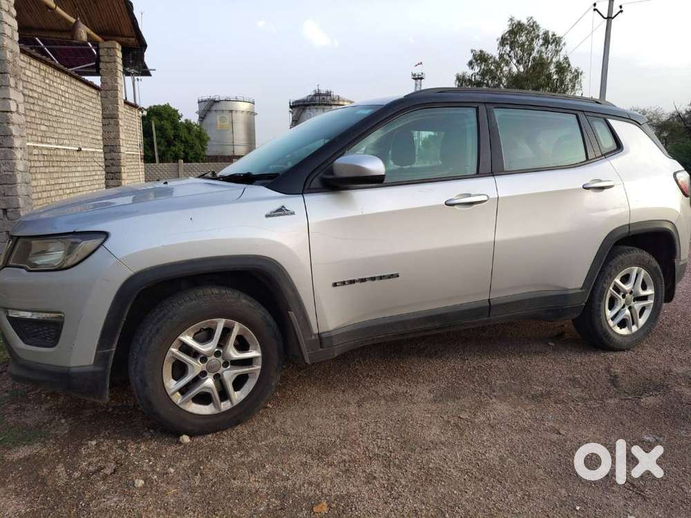 Bank Manager's Single Handed Silver Jeep Compass